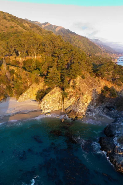 McWay Falls is an 80-foot-tall waterfall on the coast of Big Sur in central California