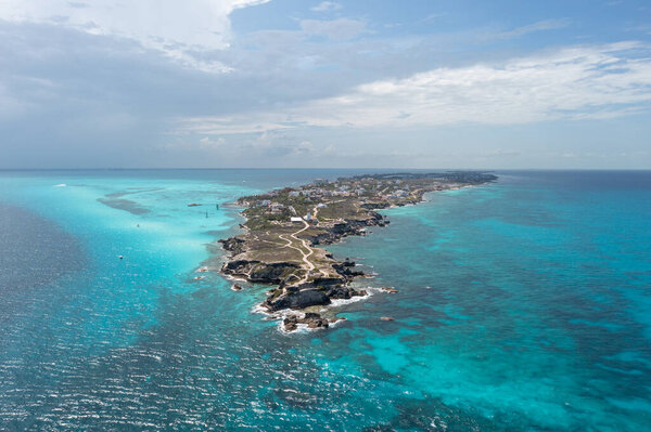 Aerial view of the clear blue waters around Punta Sur in Isla Mujeres, Mexico .