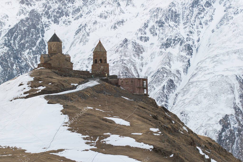 Gergeti Trinity Church in winter in Georgia Kazbegi National Park, Kazbek