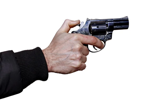 Zwarte revolver in een mannenhand geïsoleerd — Stockfoto