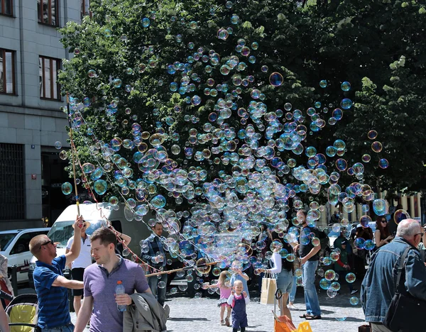 Holiday soap bubbles in the street in Prague — Stock Photo, Image