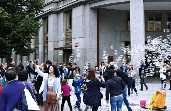 Holiday soap bubbles in the street in Prague — Stock Photo, Image