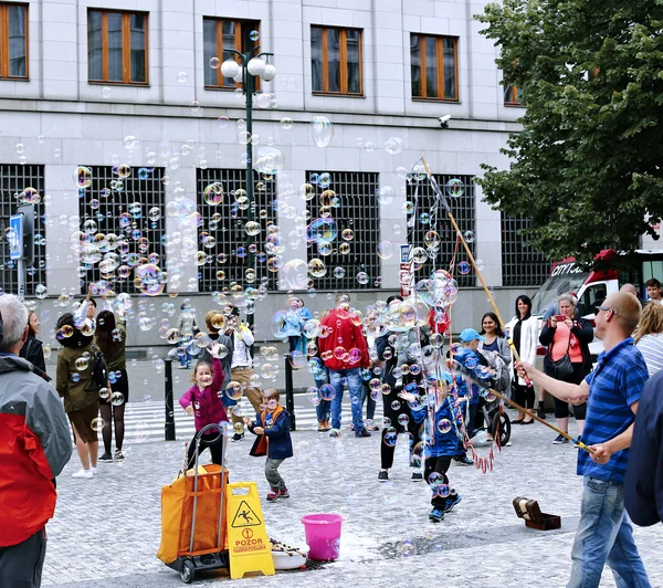 Holiday soap bubbles in the street in Prague — Stock Photo, Image