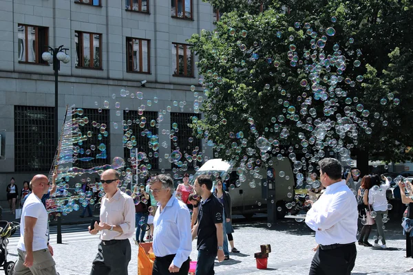 Holiday soap bubbles in the street in Prague — Stock Photo, Image