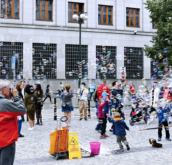 Holiday soap bubbles in the street in Prague — Stock Photo, Image