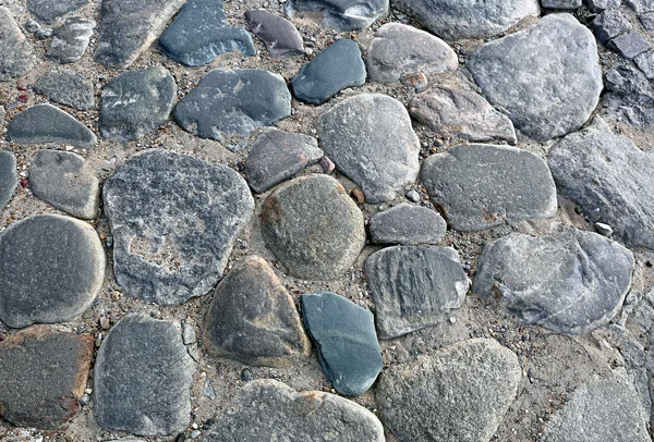 Textuur van de bestrating van grote rotsen — Stockfoto