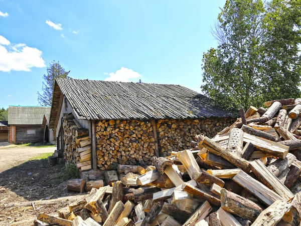 Old firewood shed in Belarus — Stock Photo, Image