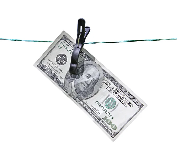 The banknote one hundred dollars on the clothesline isolated — Stock Photo, Image