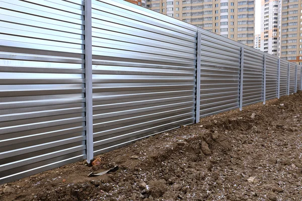 A fence made of metal professional flooring — Stock Photo, Image