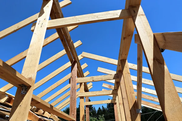 Installation of wooden beams at construction the roof truss syst — Stock Photo, Image