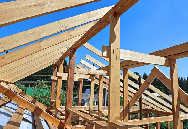 Installation of wooden beams at construction the roof truss syst — Stock Photo, Image