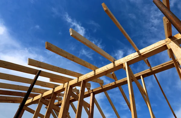 Installation of wooden beams at construction the roof truss syst — Stock Photo, Image