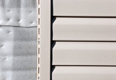 Installation on facade panels beige vinyl siding clipart