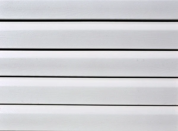 Cephe panelleri bej vinil siding üzerinde yükleme