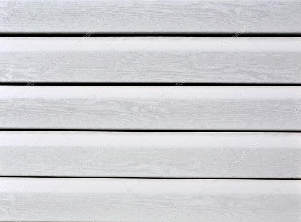 Installation on facade panels beige vinyl siding