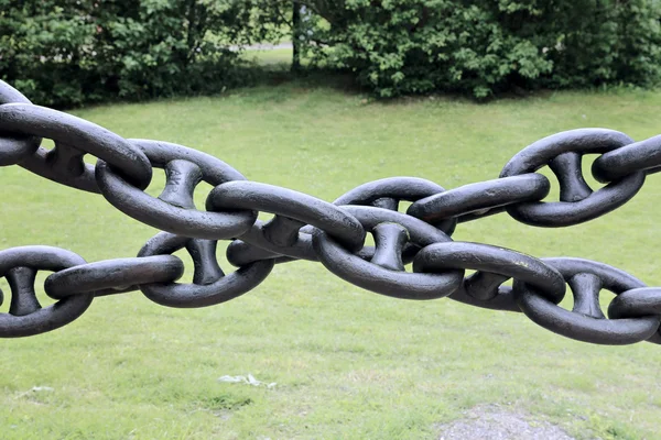 Chain of links of the old cast-iron isolated