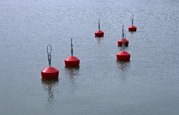 Red buoys in the lake — Stock Photo, Image