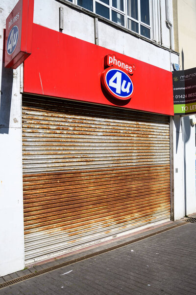 Hastings, United Kingdom - August 01 2020:  The frontage of Phones 4U  defunct Mobile phone store in Queens Road