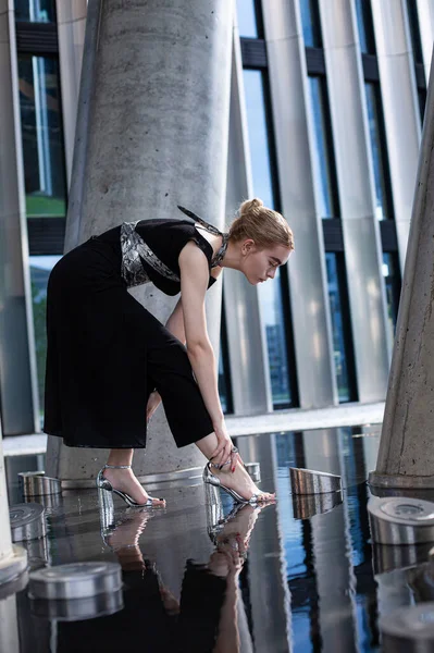 Young white model with city building background