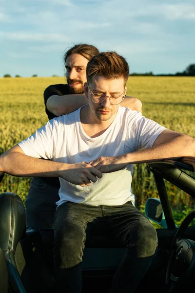 Young white european men in the countryside