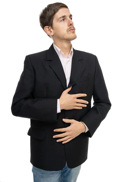 年轻英俊 瘦小的白人男子 棕色头发 穿着白色背景的黑色夹克 摸着自己的胃 — 图库照片