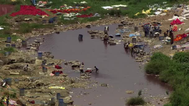 Drone View Busy Rural Riverside People Washing Clothes River Local — Stock Video