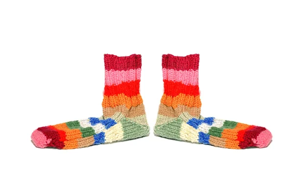 Warm knitted woolen socks knitting needles isolated on a white b — Stock Photo, Image