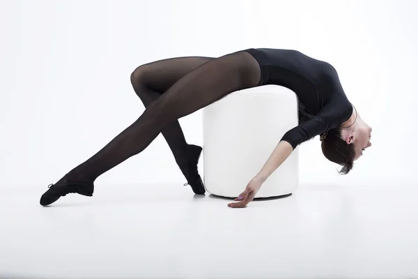 Young ballerina is warming up — Stock Photo, Image