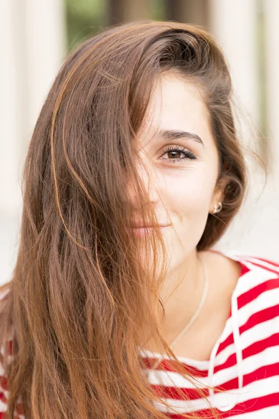 Closeup portrait of happy woman covers her face with hair, hairs — Stock Photo, Image