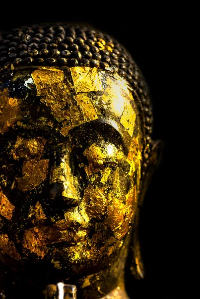 Guld buddha på svart bakgrund — Stockfoto