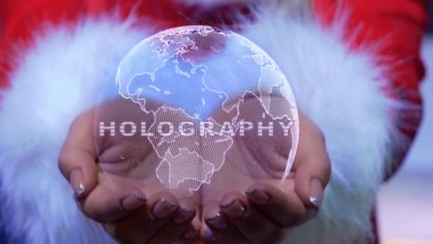Χέρια κρατώντας τον πλανήτη με κείμενο Ολογραφία — Αρχείο Βίντεο