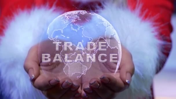 Tangan memegang planet dengan teks Keseimbangan perdagangan — Stok Video