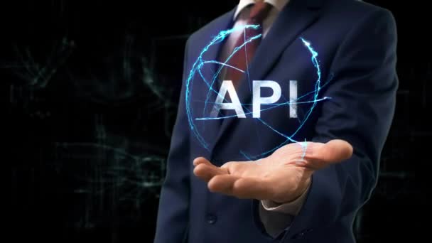 Empresário mostra conceito holograma API — Vídeo de Stock