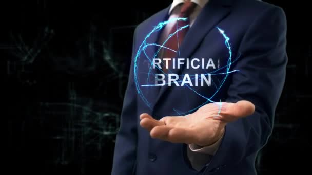 Businessman shows concept hologram Artificial brain — Stock Video