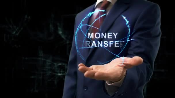 Businessman shows concept hologram Money Transfer — Stock Video