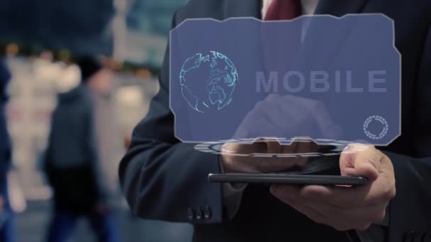 Бізнесмен використовує голограму Мобільний — стокове відео