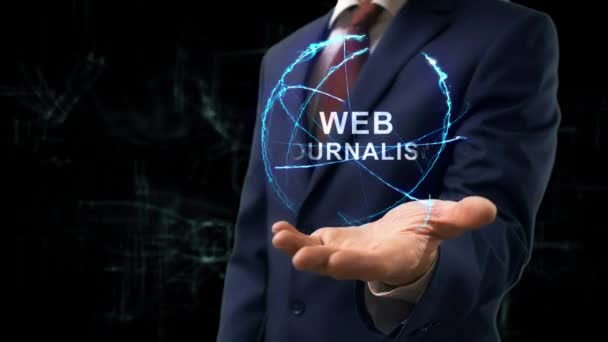 Бизнесмен демонстрирует концептуальную голограмму Web Journalism — стоковое видео