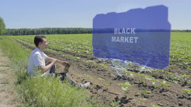 El hombre utiliza el mercado negro HUD — Vídeo de stock