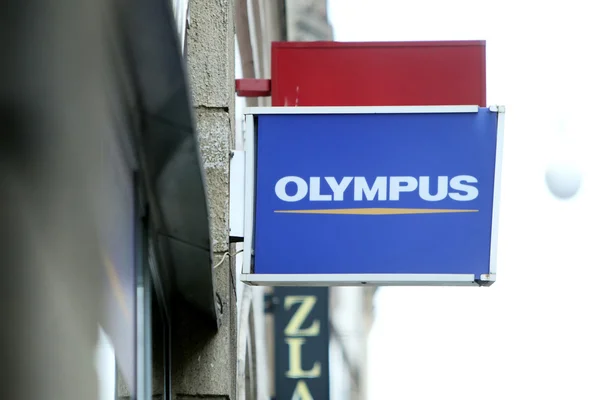 Olympus shop sign — Stock Photo, Image