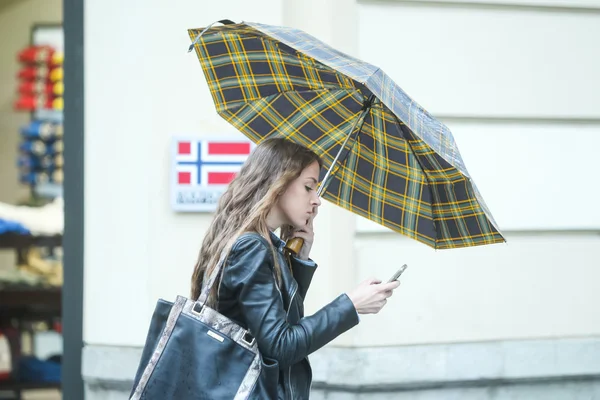 Woman with umbrella — Stock Photo, Image