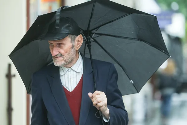 Senior adult on street — Stock Photo, Image