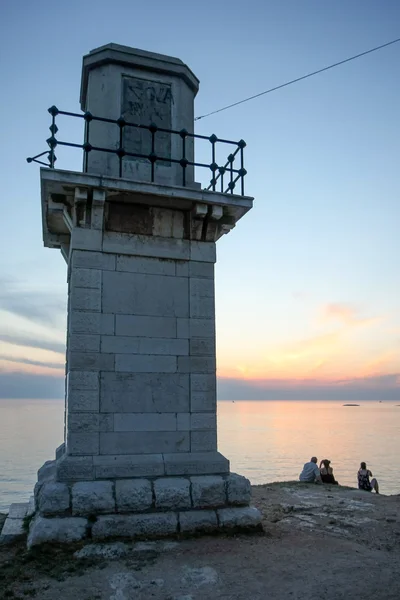 Tourists watching sunset in Rovinj — Stock Photo, Image