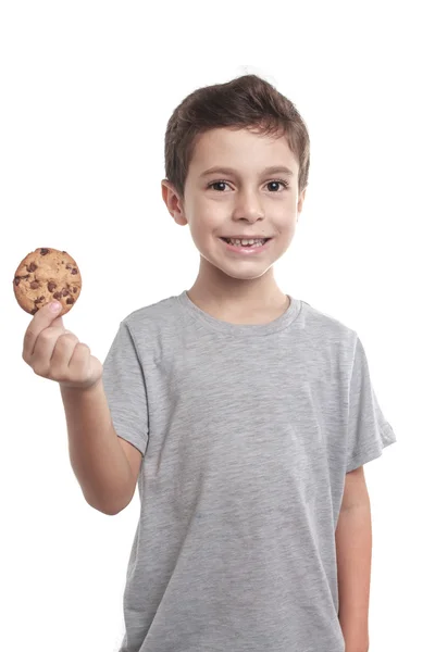 Pequeño niño comiendo galletas de chocolate —  Fotos de Stock