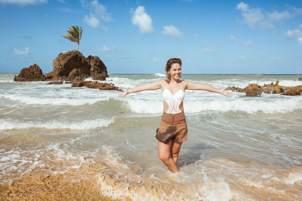 Woman in Tambaba Beach in Brazil, known for allowing the practice of nudism / naturism