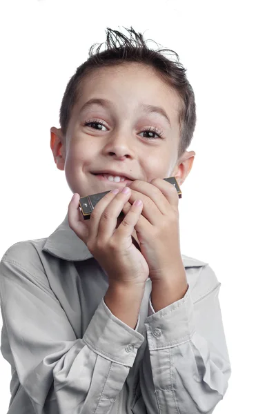 Barn spelar munspel — Stockfoto