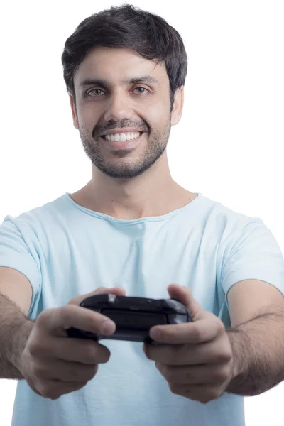 Uomo che gioca al videogioco con joystick wireless — Foto Stock