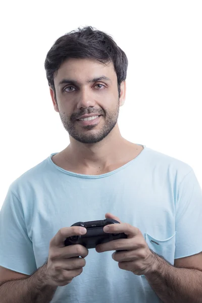 Anak muda bermain video game dengan joystick nirkabel — Stok Foto