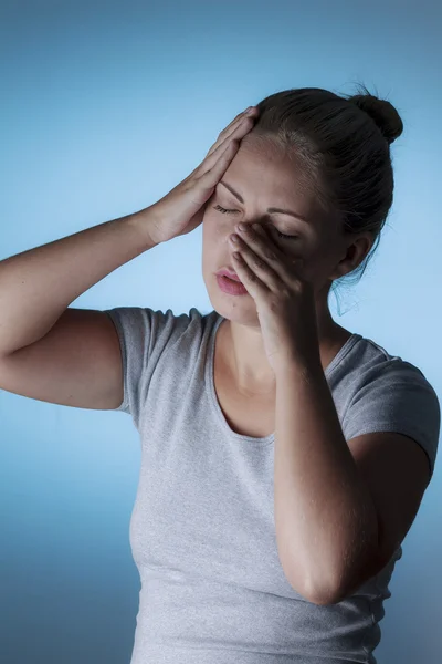 Sinus pain, sinus pressure, sinusitis. Sad woman holding her nos — Stock Photo, Image