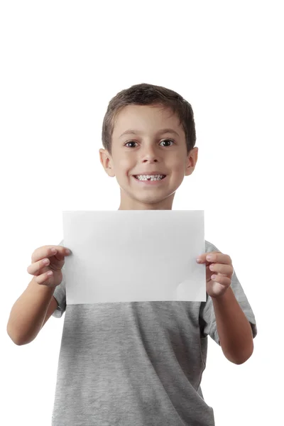Criança com uma placa branca isolada no fundo branco — Fotografia de Stock