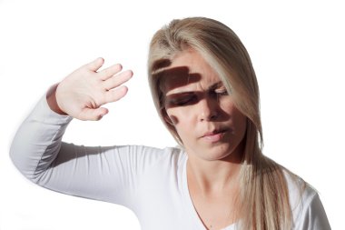 Photophobia. Woman protects her eyes from bright light with your clipart